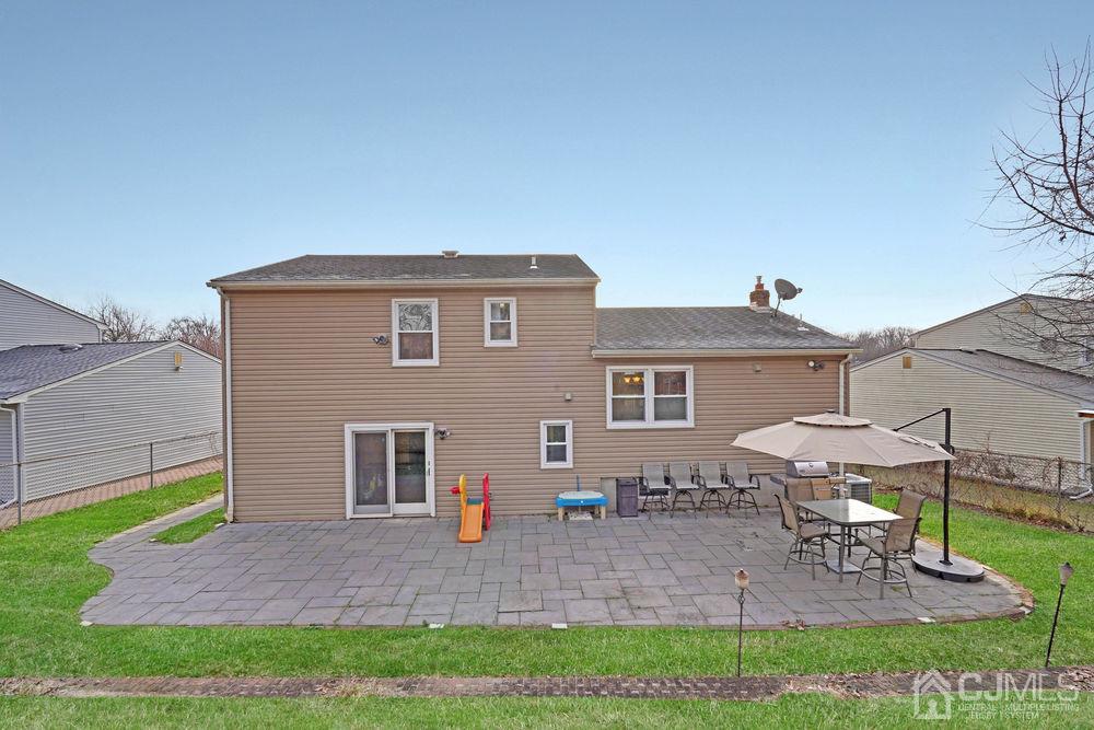 46 Brookside Road Edison, NJ 08817 - Photo 37 of 38 a view of a house with a yard