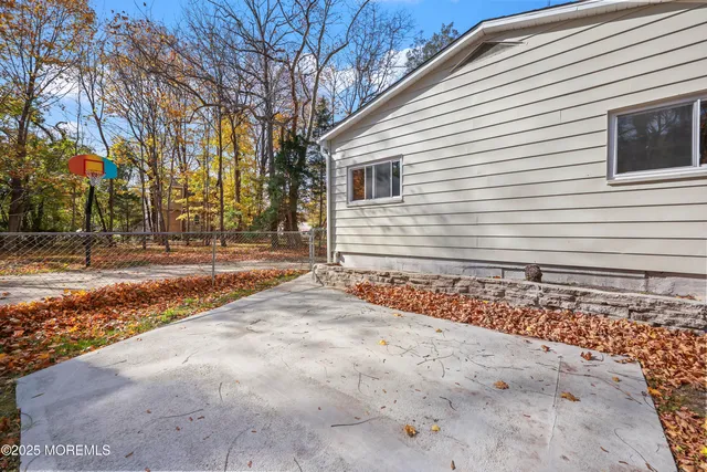 a view of a hallway with a potted plant