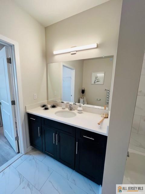 463 Old Post Road Edison, NJ 08817 - Photo 13 of 21 a bathroom with a double vanity sink and mirror