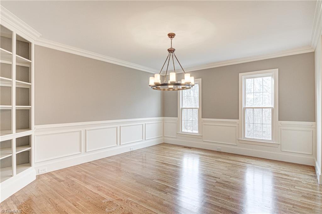 5064 Bunch Road Summerfield, NC 27358 - Photo 17 of 46 Gather and enjoy dinners from this beautiful formal dining rm