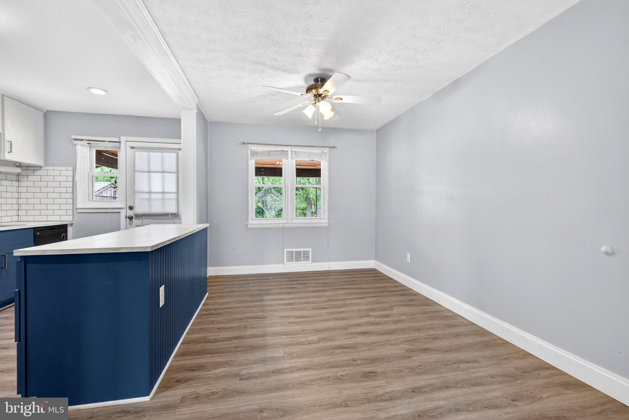 7729 Charlesmont Road Baltimore, MD 21222 - Photo 11 of 38 Bright and airy open space awaits.