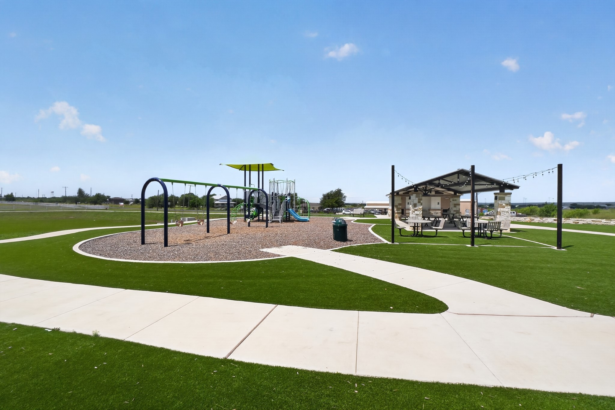 604 Marty Allen Loop Jarrell, TX 76537 - Photo 14 of 15 A community playground and covered picnic area await, perfect for outdoor enjoyment.