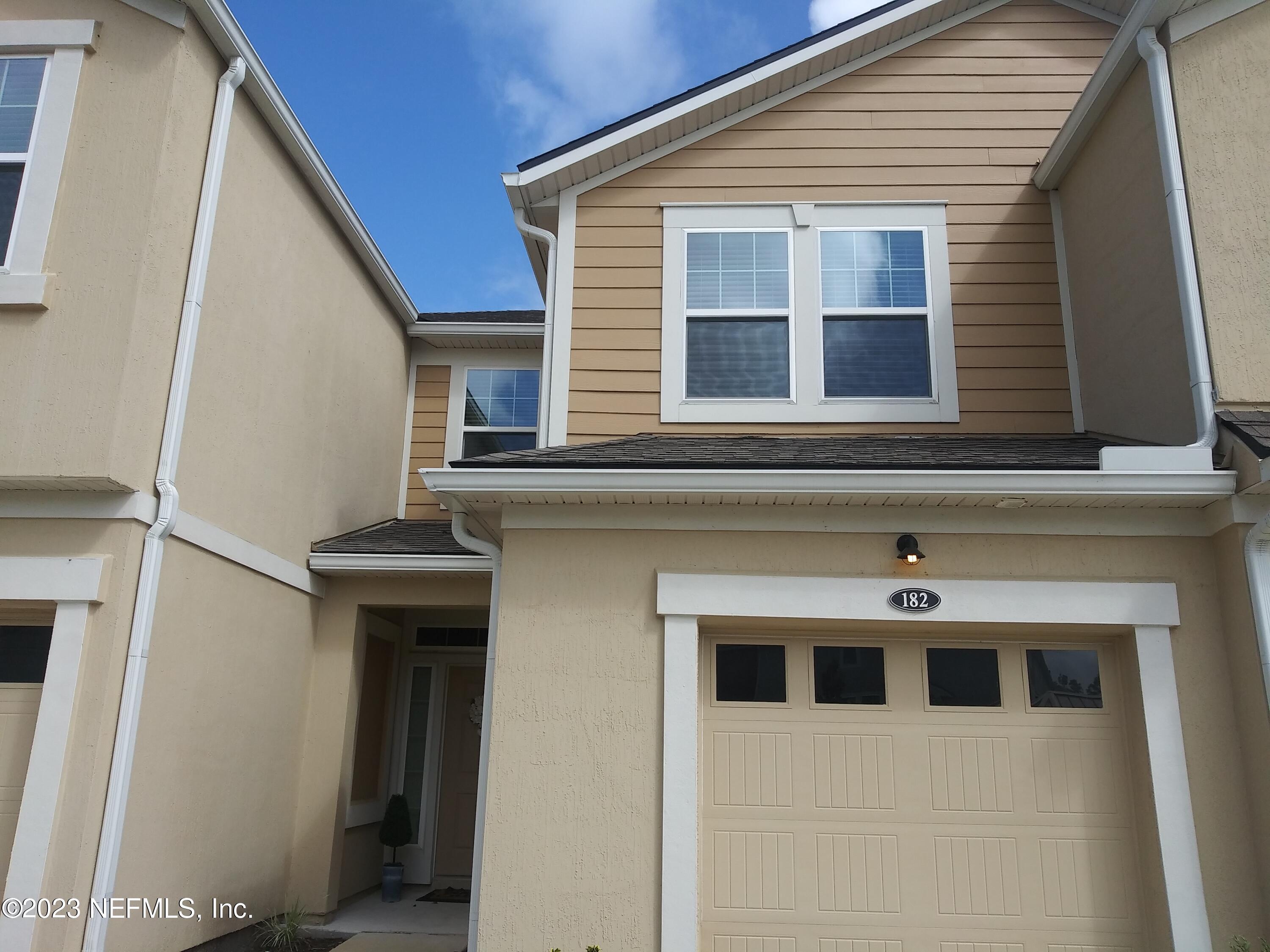 182 Nelson Lane St. Johns, FL 32259 - Photo 23 of 32 a front view of a house with windows