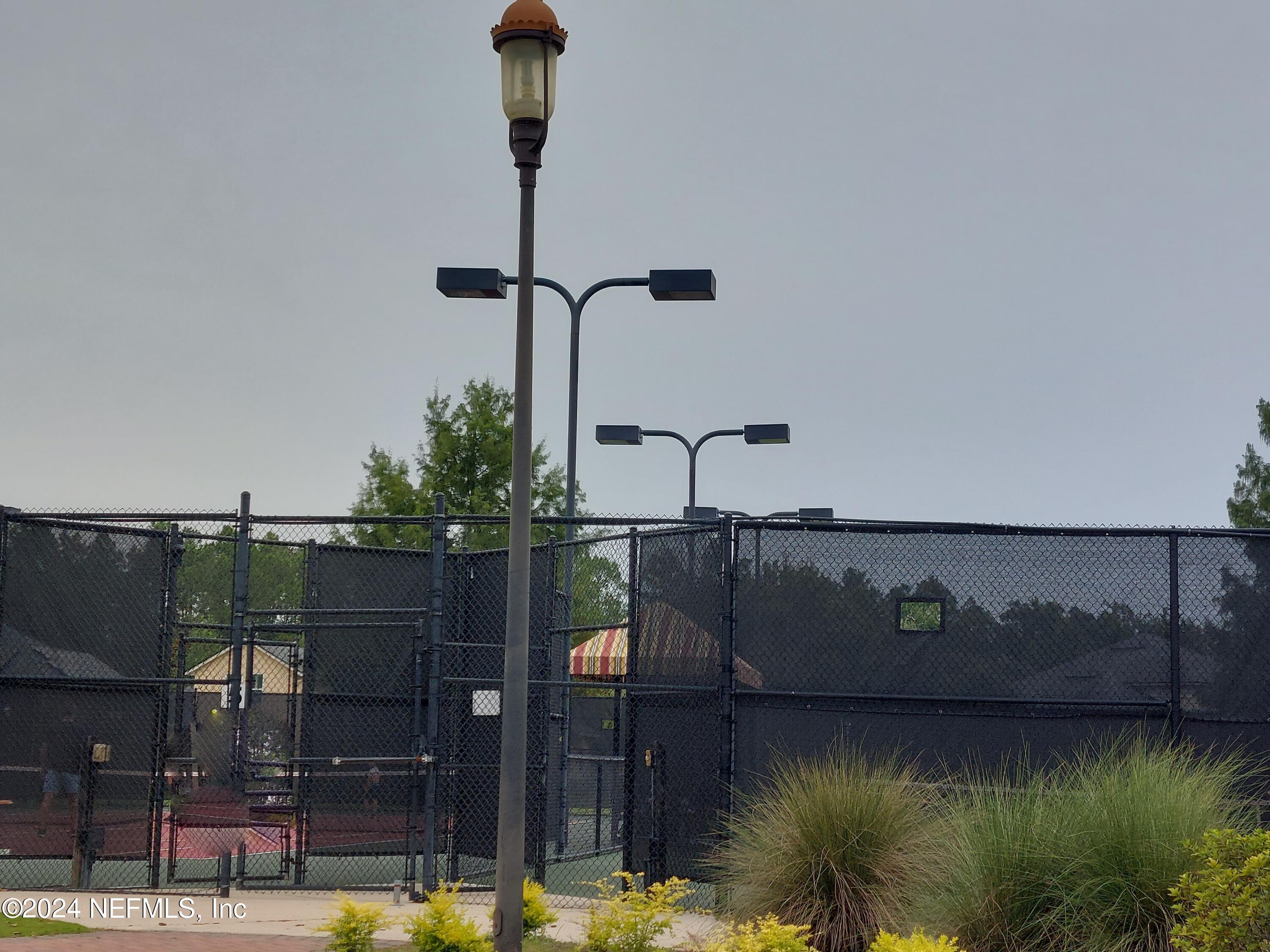 182 Nelson Lane St. Johns, FL 32259 - Photo 28 of 32 a front view of a house with lake view
