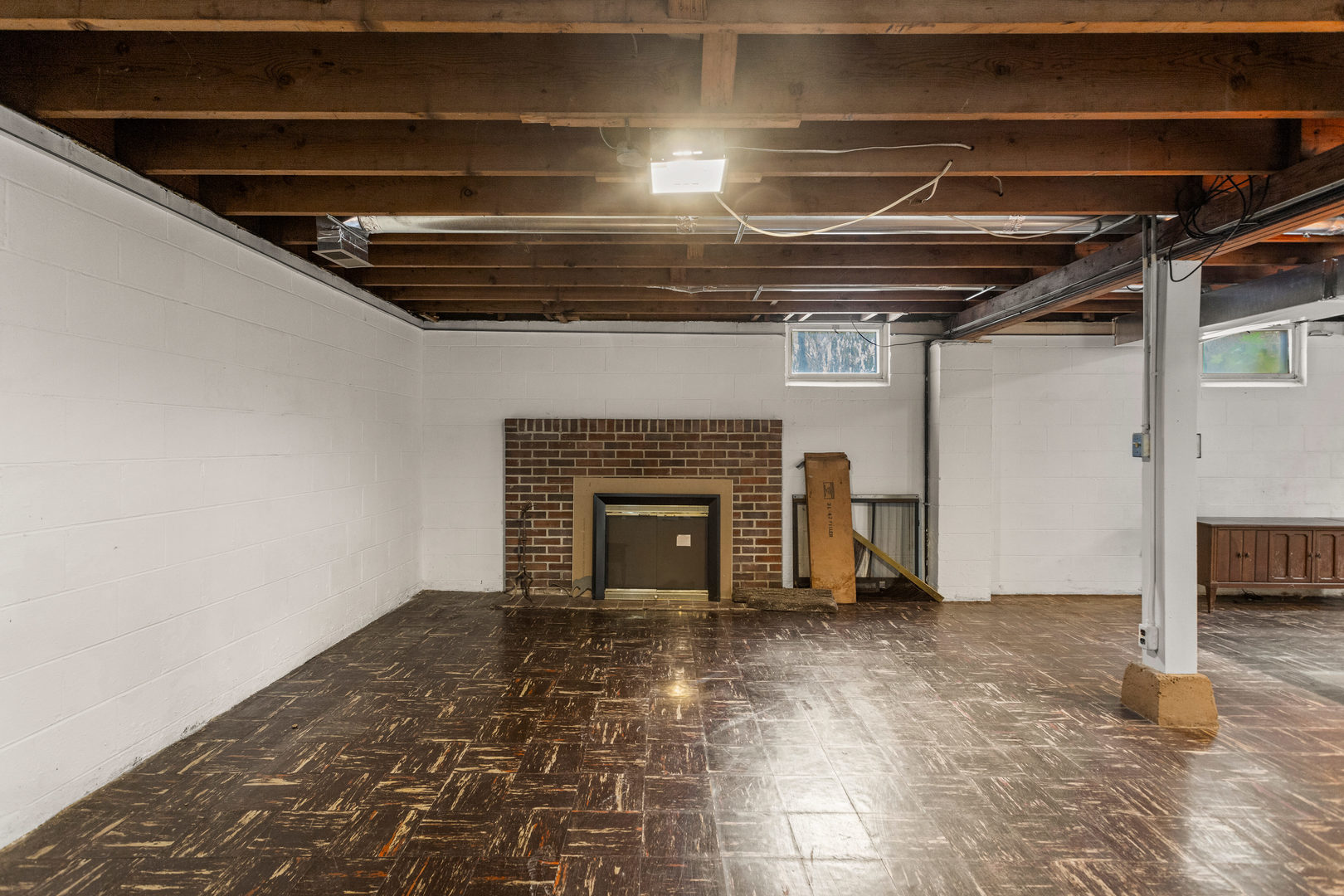 904 West Kirby Avenue Champaign, IL 61821 - Photo 33 of 46 a view of empty room with wooden floor and fireplace