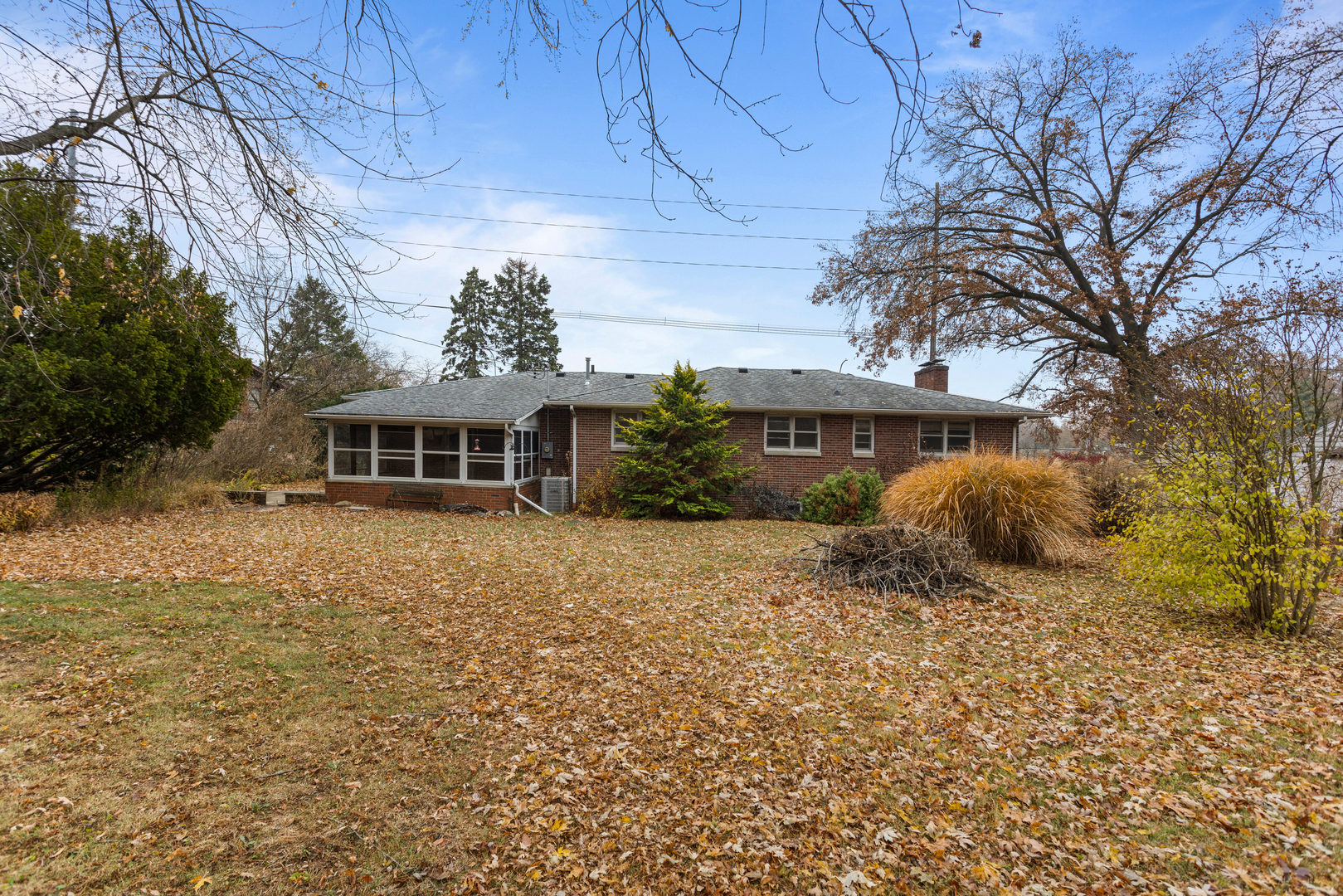 904 West Kirby Avenue Champaign, IL 61821 - Photo 38 of 46 a front view of a house with a garden