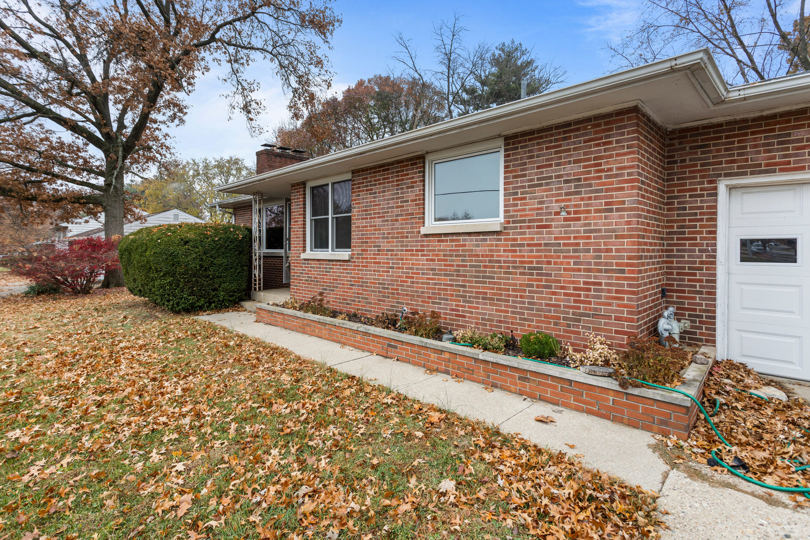 904 West Kirby Avenue Champaign, IL 61821 - Photo 43 of 46 a front view of a house with a yard