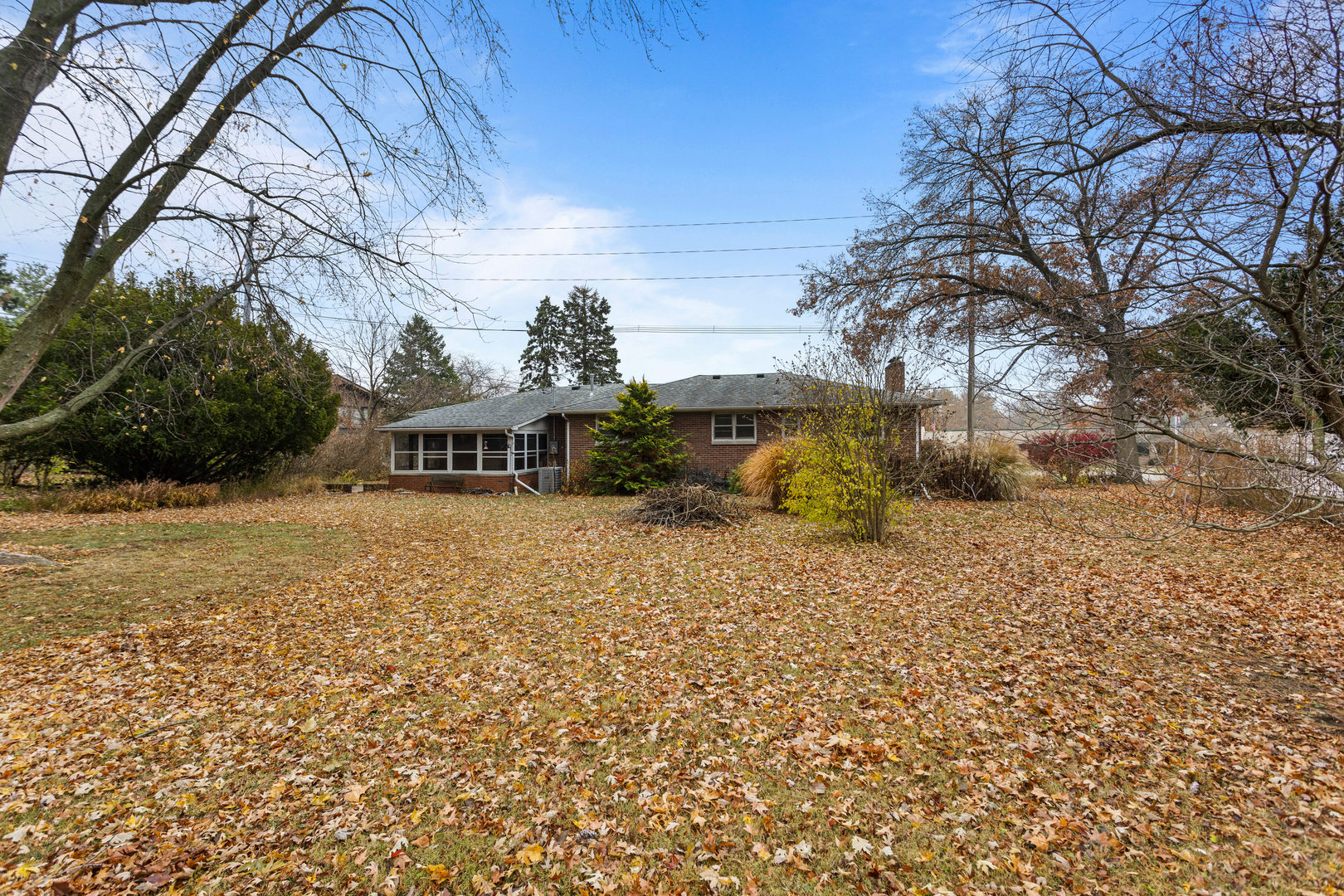 904 West Kirby Avenue Champaign, IL 61821 - Photo 44 of 46 a front view of a house with a yard