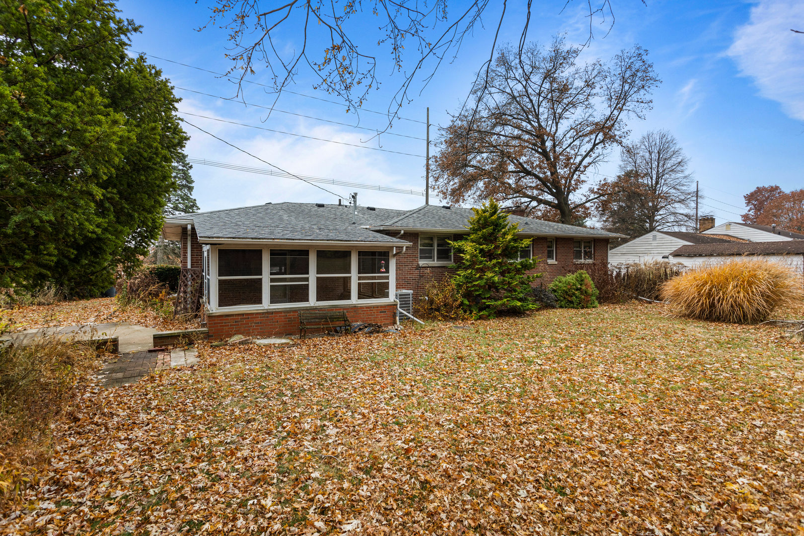 904 West Kirby Avenue Champaign, IL 61821 - Photo 45 of 46 a front view of a house with a yard