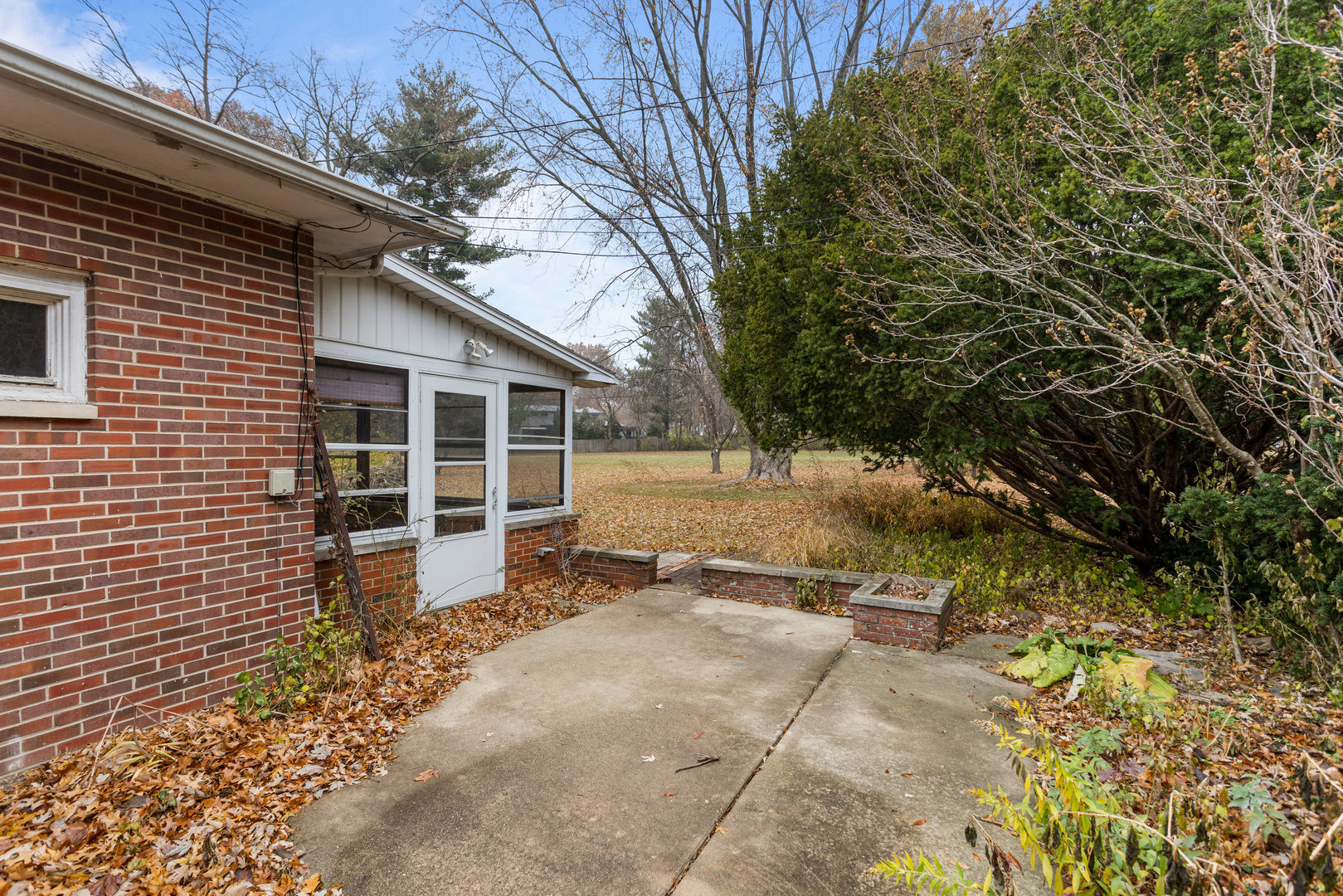 904 West Kirby Avenue Champaign, IL 61821 - Photo 46 of 46 a view of a house with a backyard