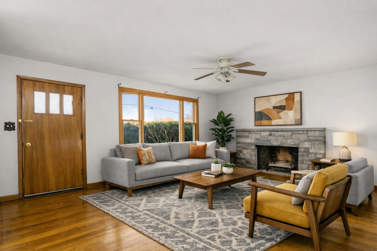 904 West Kirby Avenue Champaign, IL 61821 - Photo 6 of 46 a living room with furniture and a fireplace