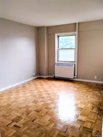 an empty room with window