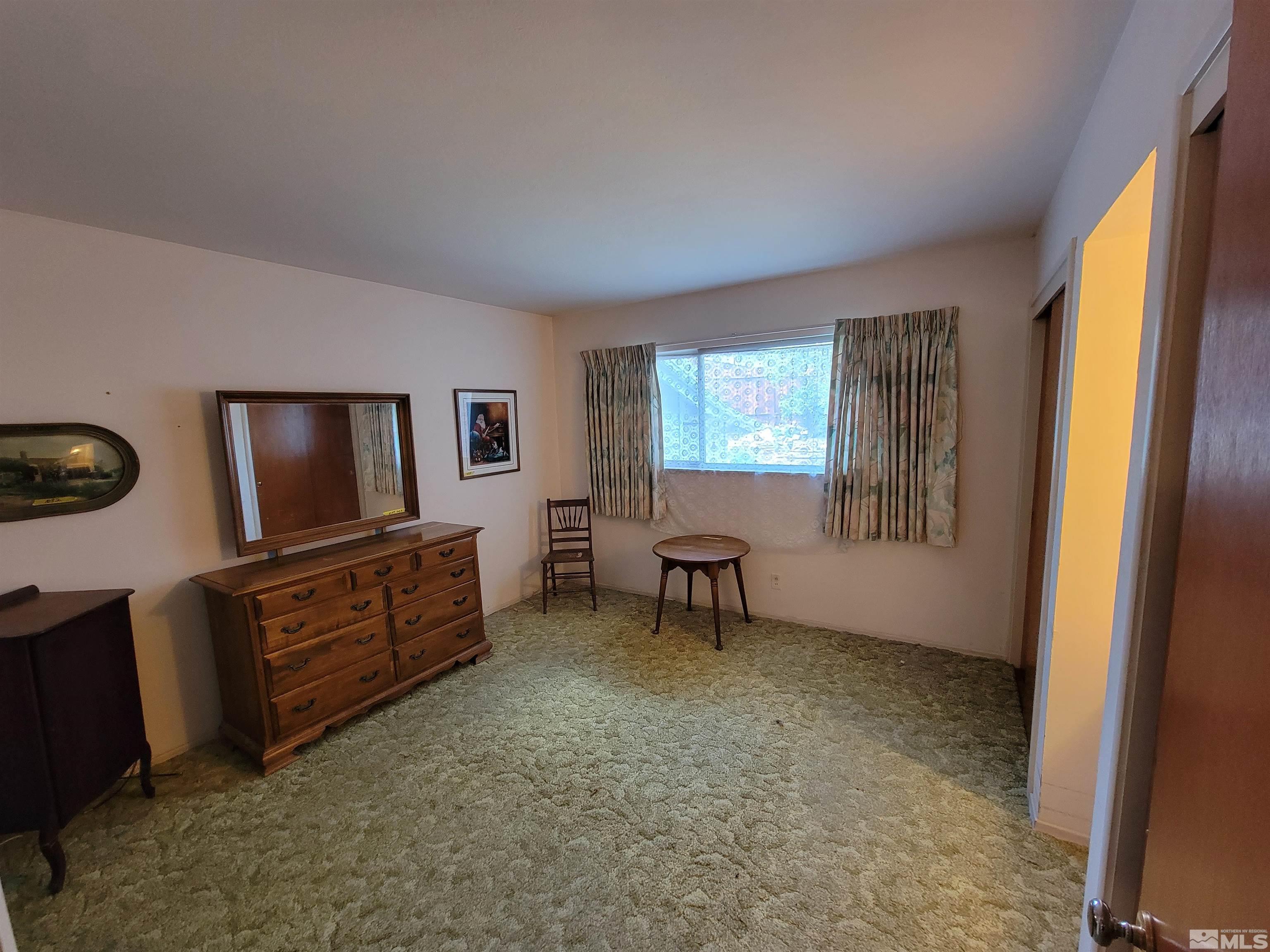 1985 Gridley Avenue Reno, NV 89503 - Photo 8 of 29 a living room with furniture and a flat screen tv