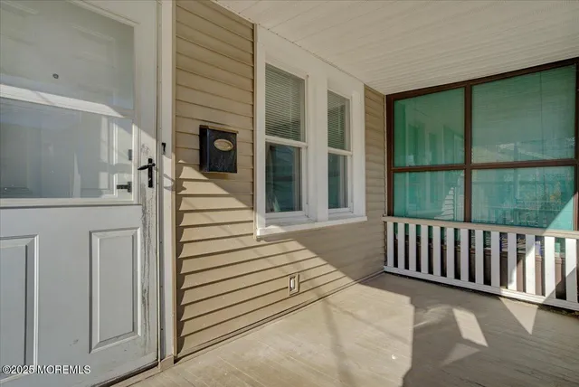 a view of a balcony with stairs
