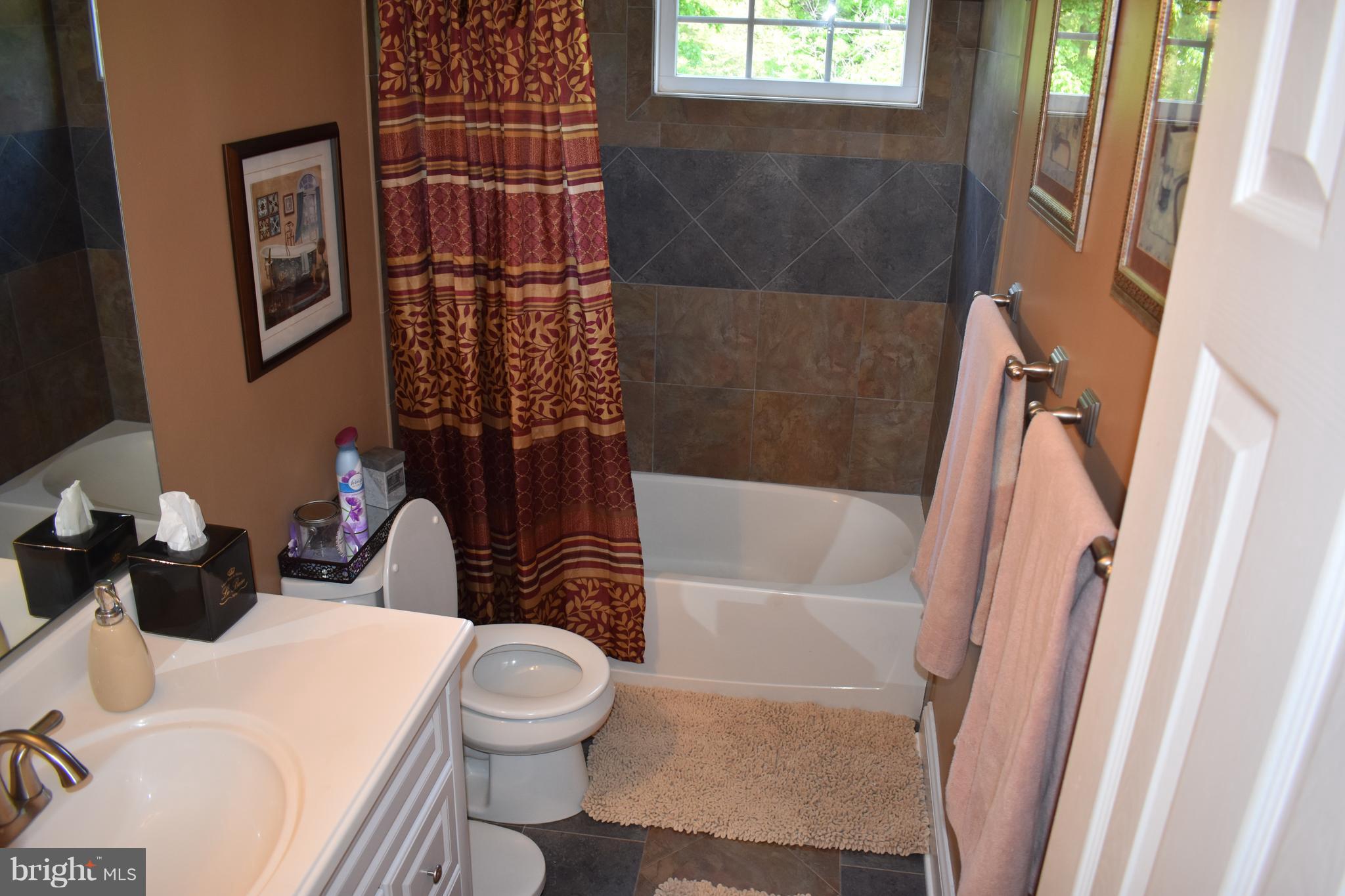 8618 Stonewall Road Manassas, VA 20110 - Photo 19 of 30 Ceramic tile floors w/ a newer vanity!