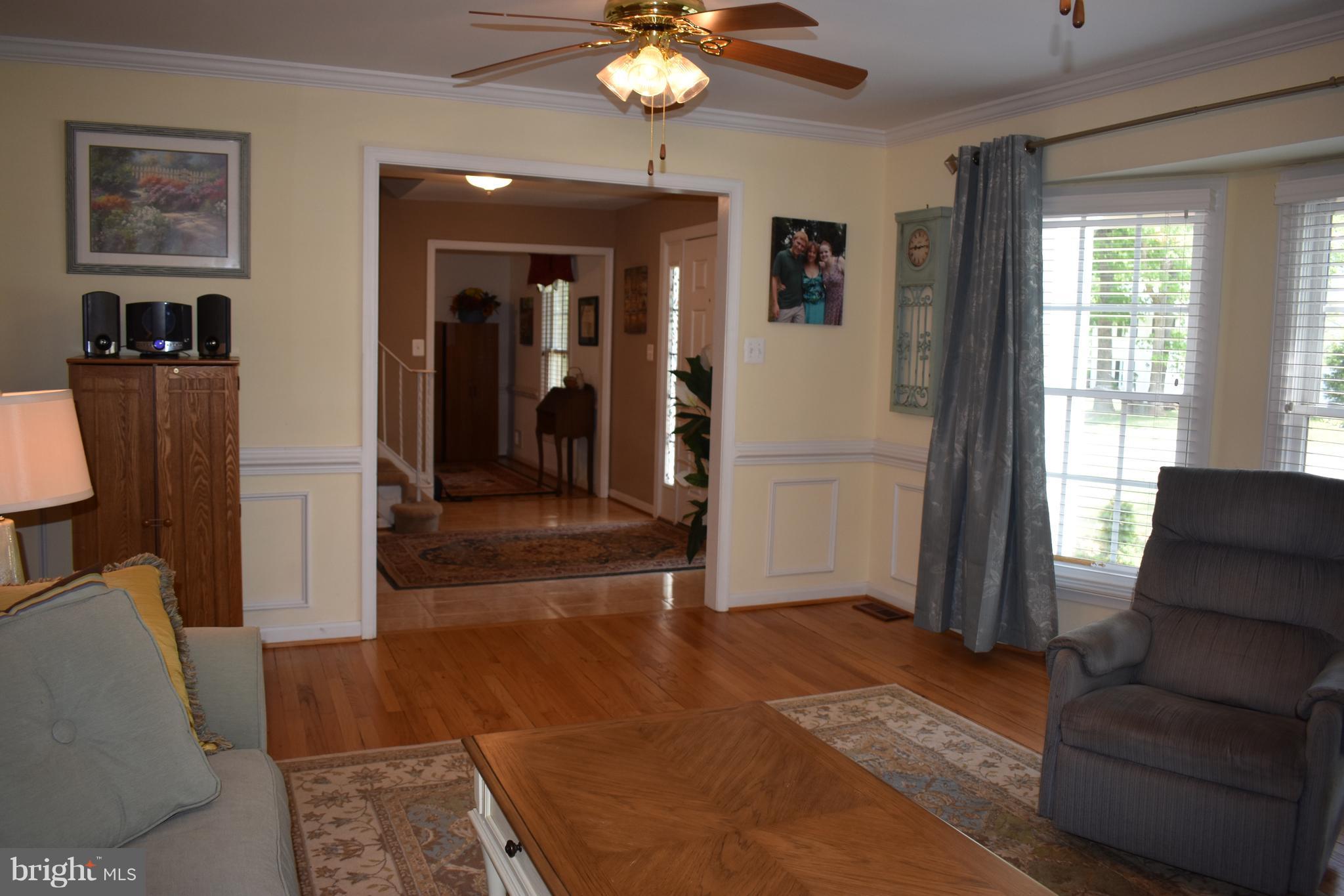 8618 Stonewall Road Manassas, VA 20110 - Photo 5 of 30 Main level hardwoods and ceramic tile floors