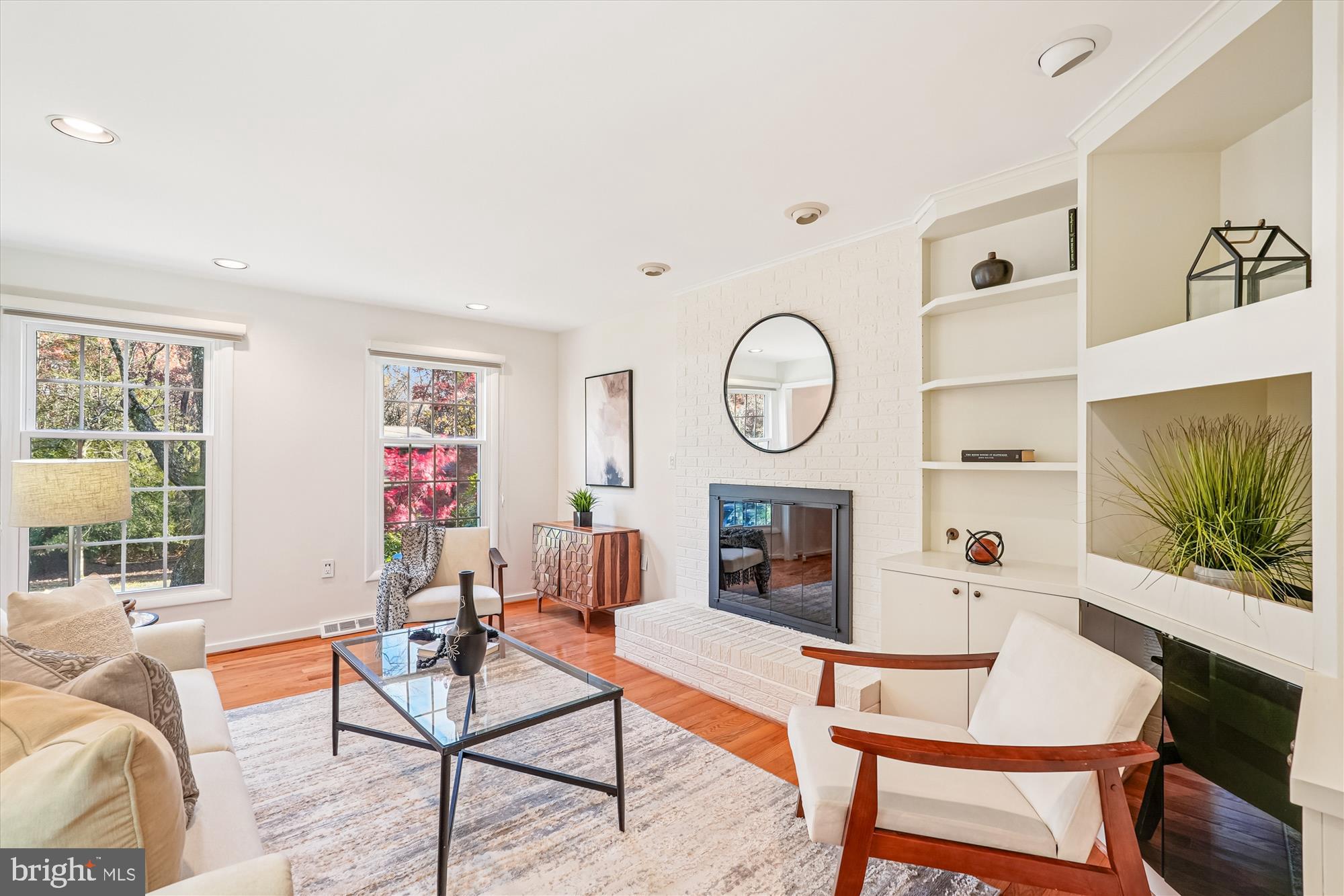11410 Running Cedar Road Reston, VA 20191 - Photo 20 of 56 a living room with furniture a flat screen tv and a window