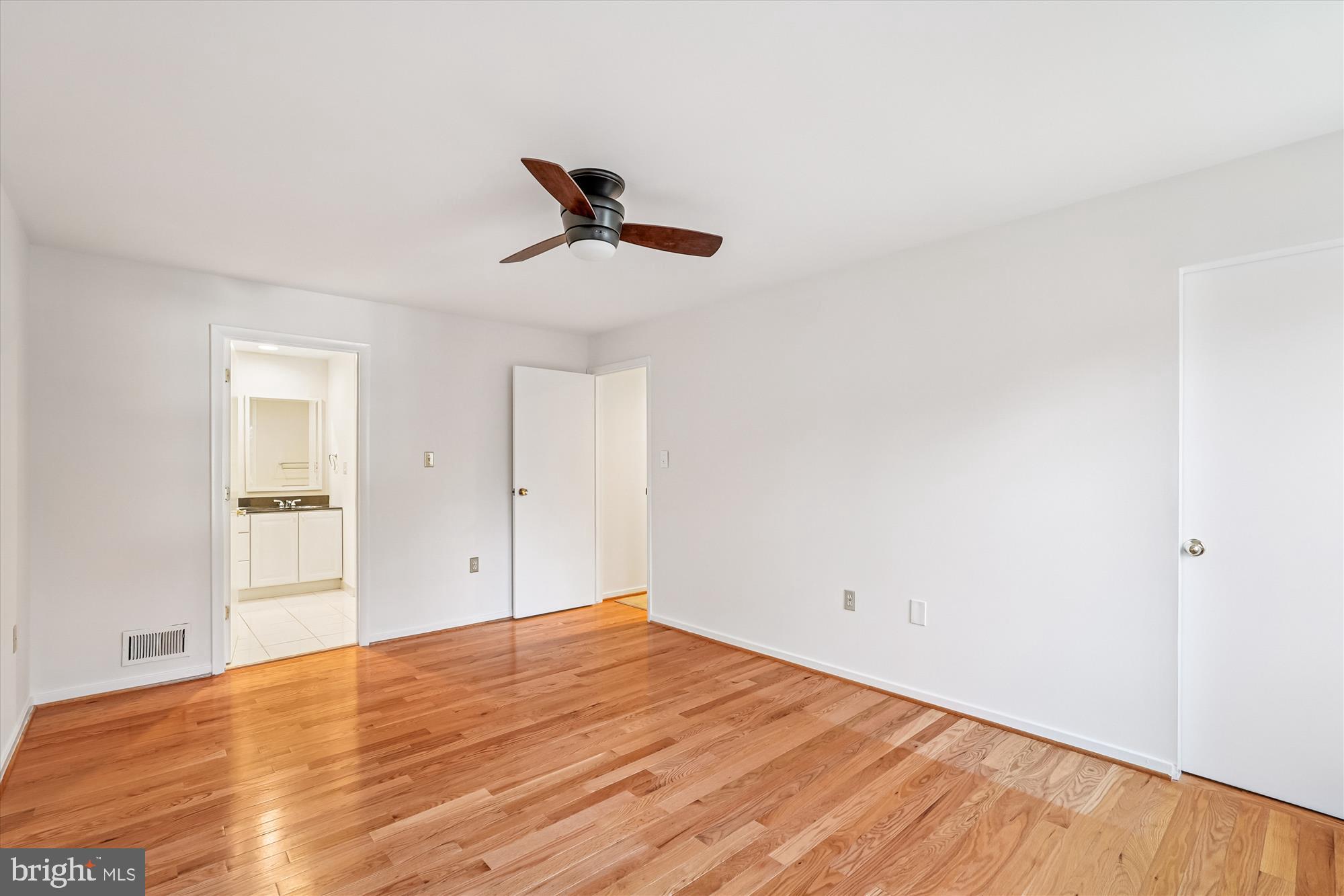 11410 Running Cedar Road Reston, VA 20191 - Photo 27 of 56 a view of empty room with wooden floor