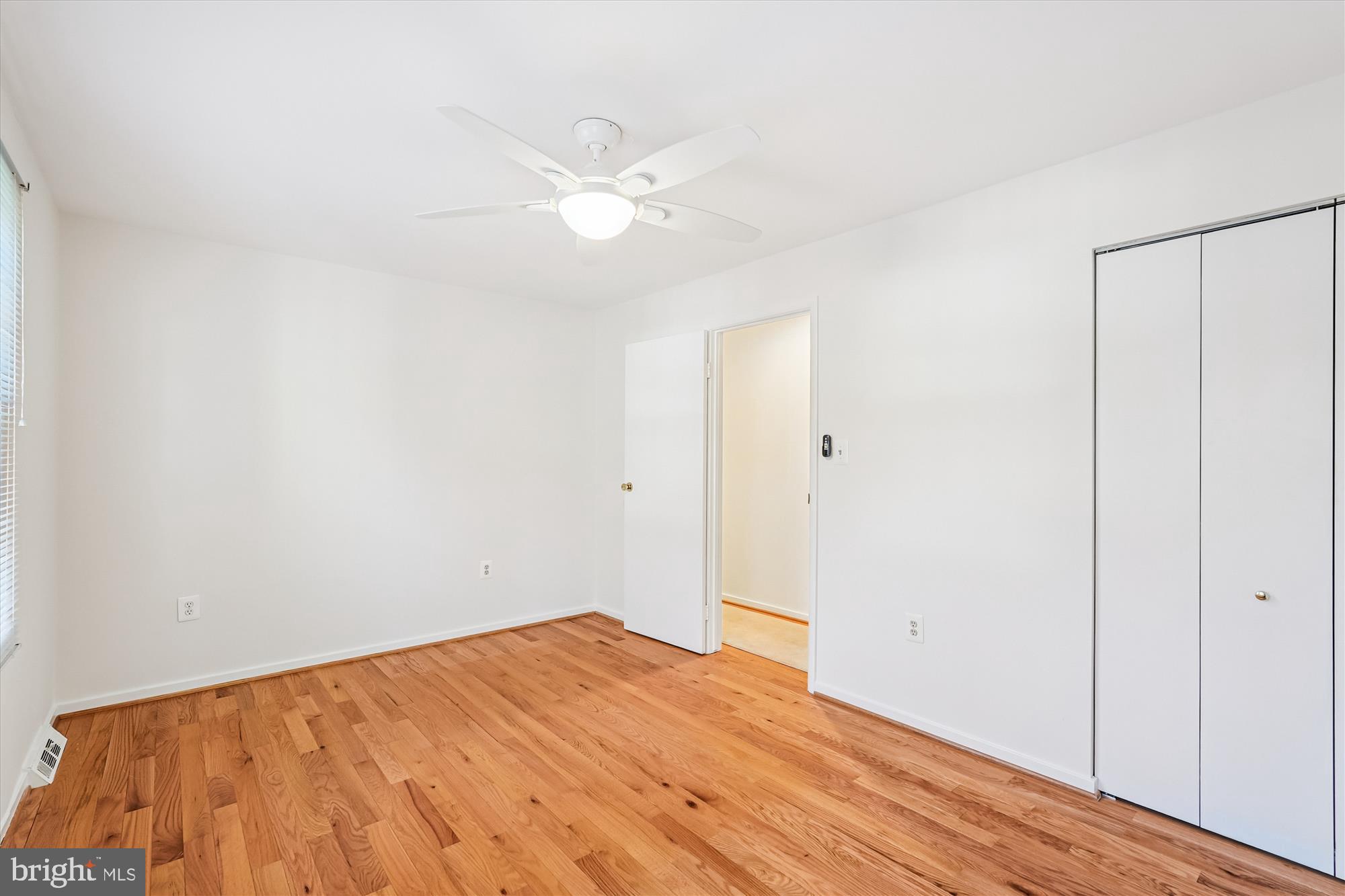 11410 Running Cedar Road Reston, VA 20191 - Photo 34 of 56 a view of empty room with wooden floor