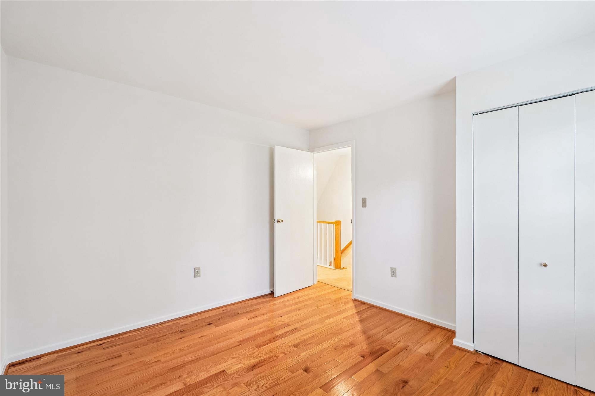 11410 Running Cedar Road Reston, VA 20191 - Photo 40 of 56 a view of empty room with wooden floor