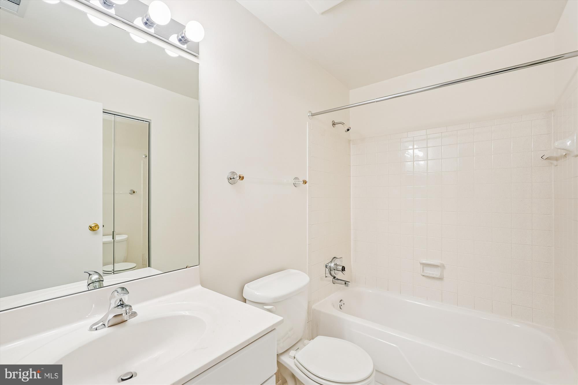 11410 Running Cedar Road Reston, VA 20191 - Photo 41 of 56 a bathroom with a sink a toilet and shower