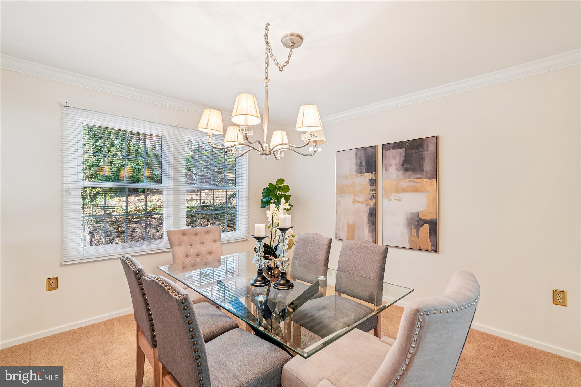 11410 Running Cedar Road Reston, VA 20191 - Photo 9 of 56 a dining room with wooden floor a chandelier a wooden table and chairs