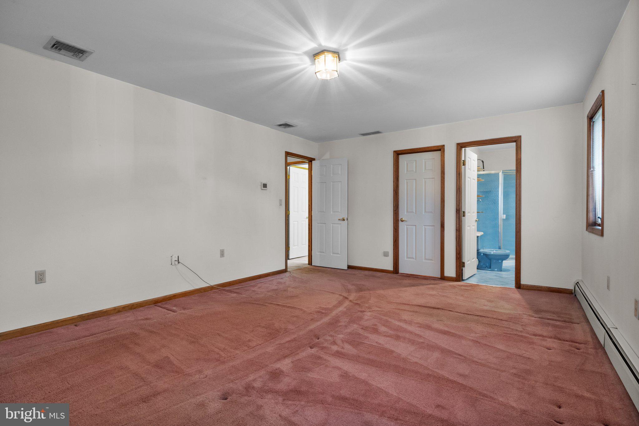 104 Park Road Ambler, PA 19002 - Photo 21 of 39 Master Bedroom facing hallway & bathroom