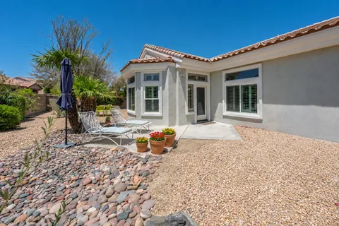 a front view of a house with patio