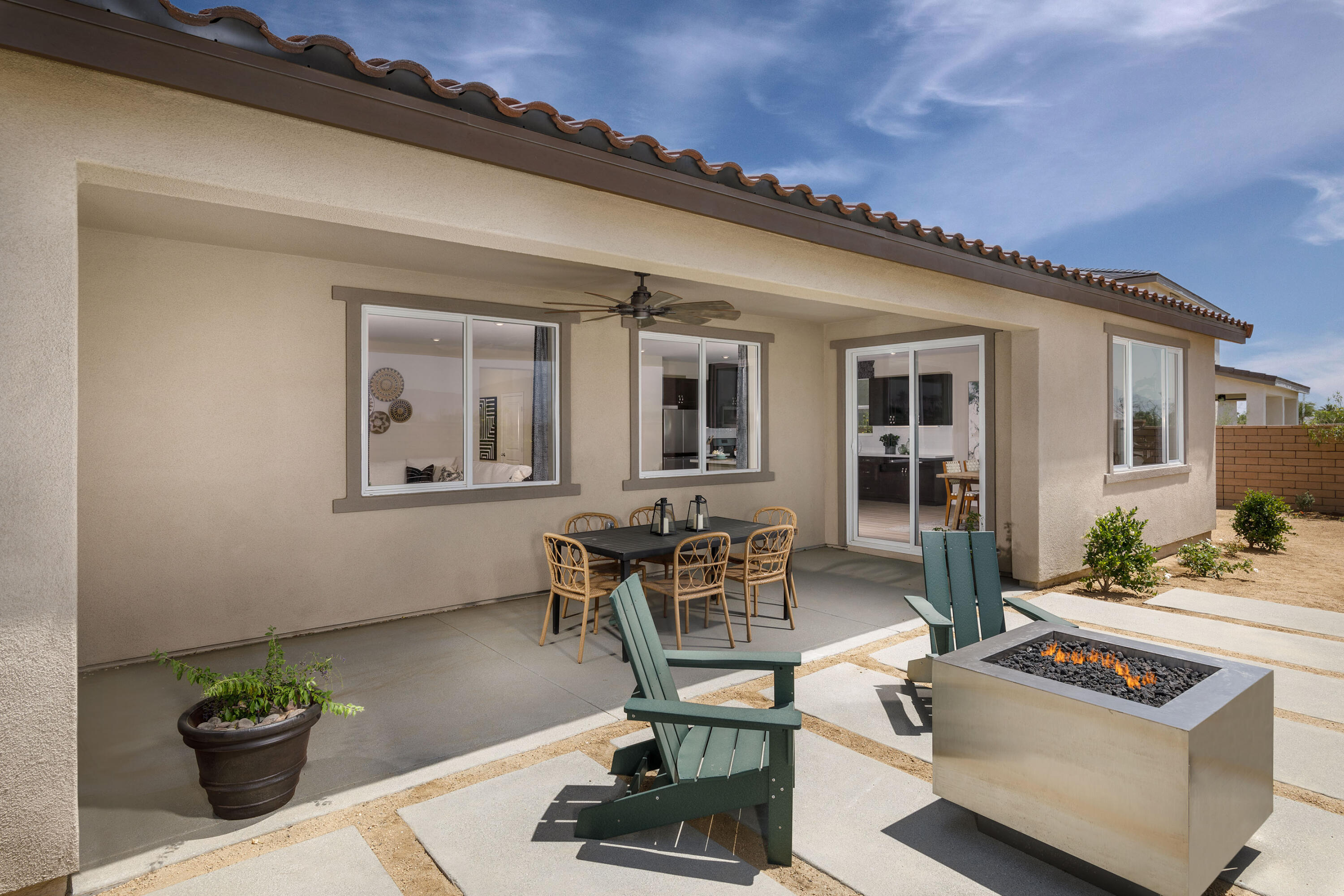 79687 Bolton Drive Indio, CA 92203 - Photo 6 of 13 a living room with furniture and a potted plant