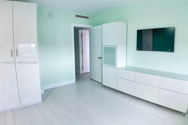 a view of an empty room with window