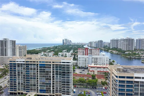 a view of a city with tall buildings