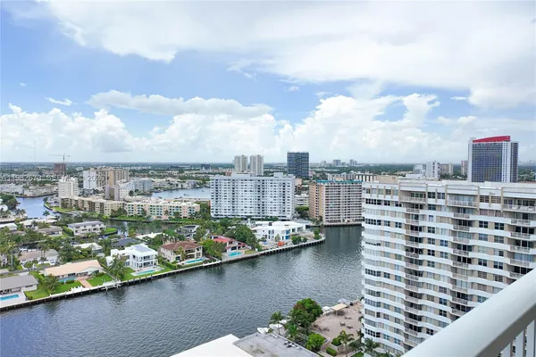a view of a city with tall buildings