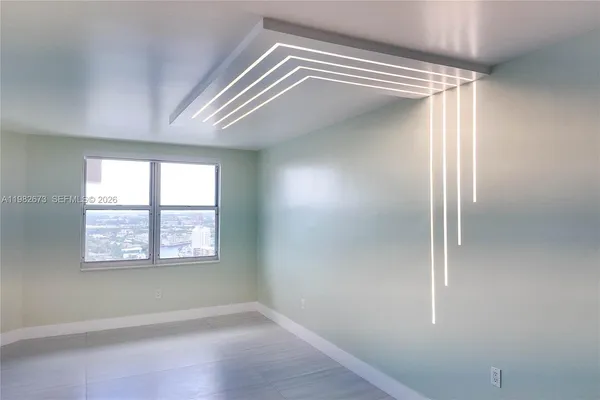 an empty room with windows