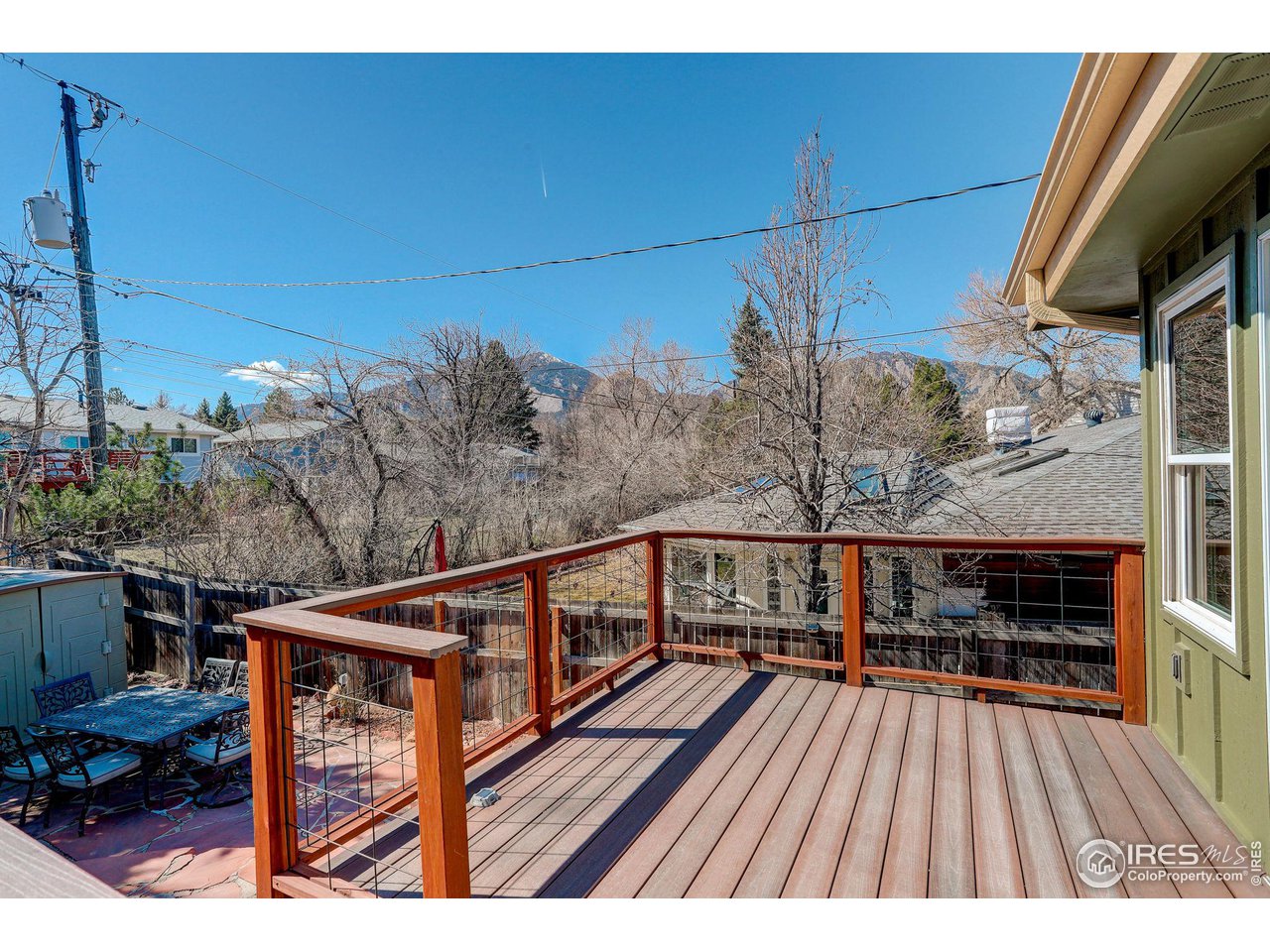 4361 Butler Circle Boulder, CO 80305 - Photo 15 of 39 a view of balcony with wooden floor and outdoor seating