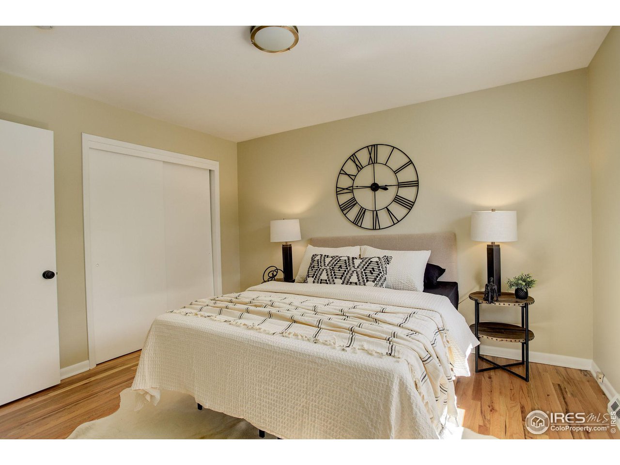 4361 Butler Circle Boulder, CO 80305 - Photo 17 of 39 a bedroom with a bed and a table in it