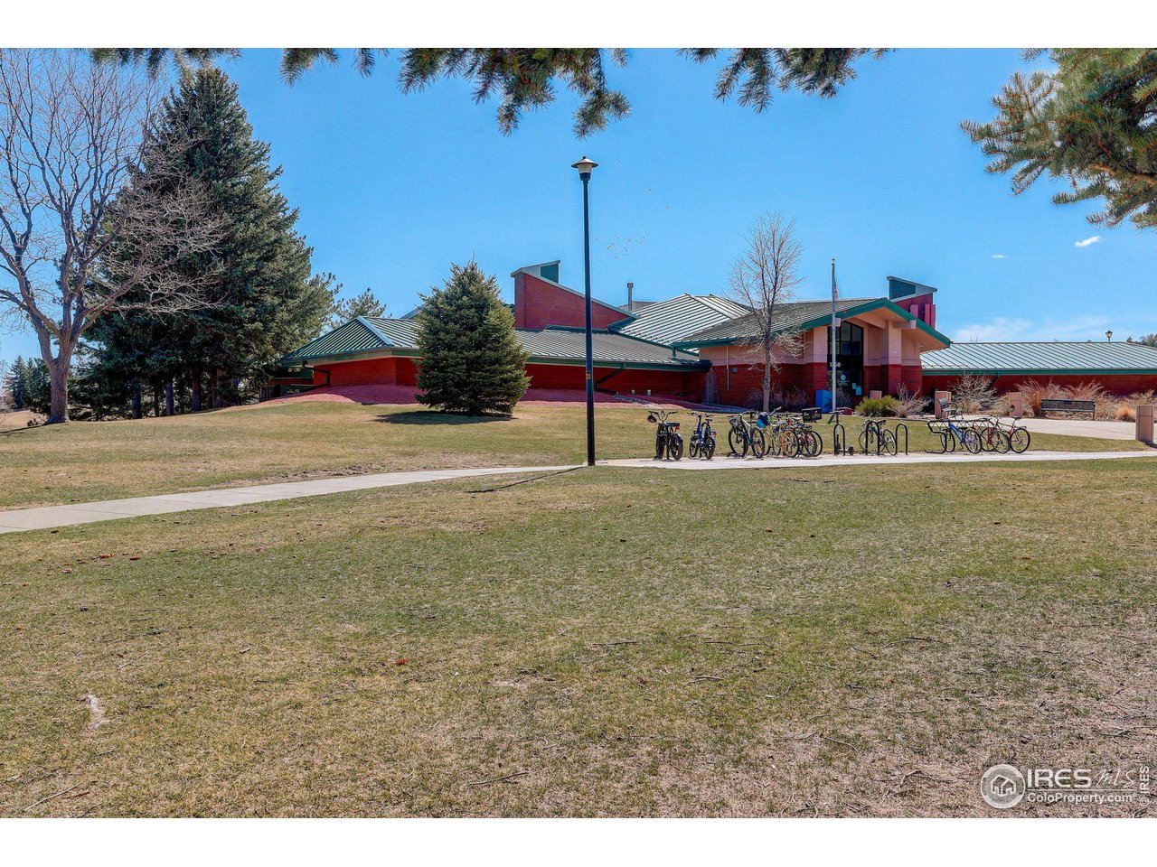4361 Butler Circle Boulder, CO 80305 - Photo 36 of 39 a view of a house with a yard