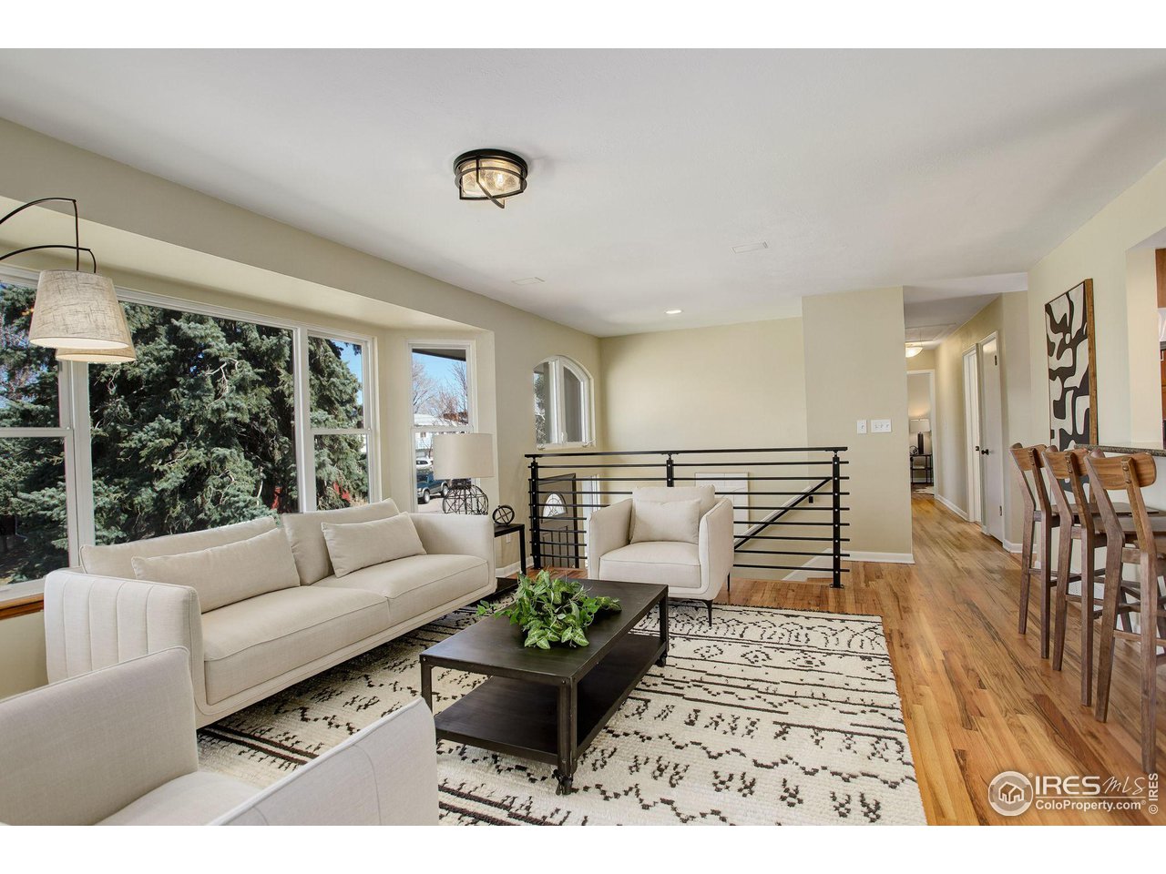4361 Butler Circle Boulder, CO 80305 - Photo 5 of 39 a living room with furniture and a table