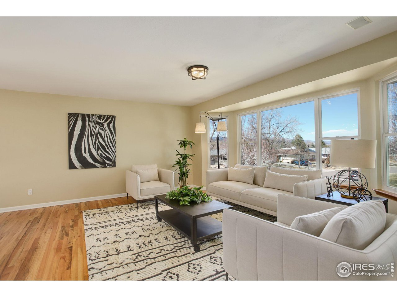 4361 Butler Circle Boulder, CO 80305 - Photo 6 of 39 a living room with furniture and a large window