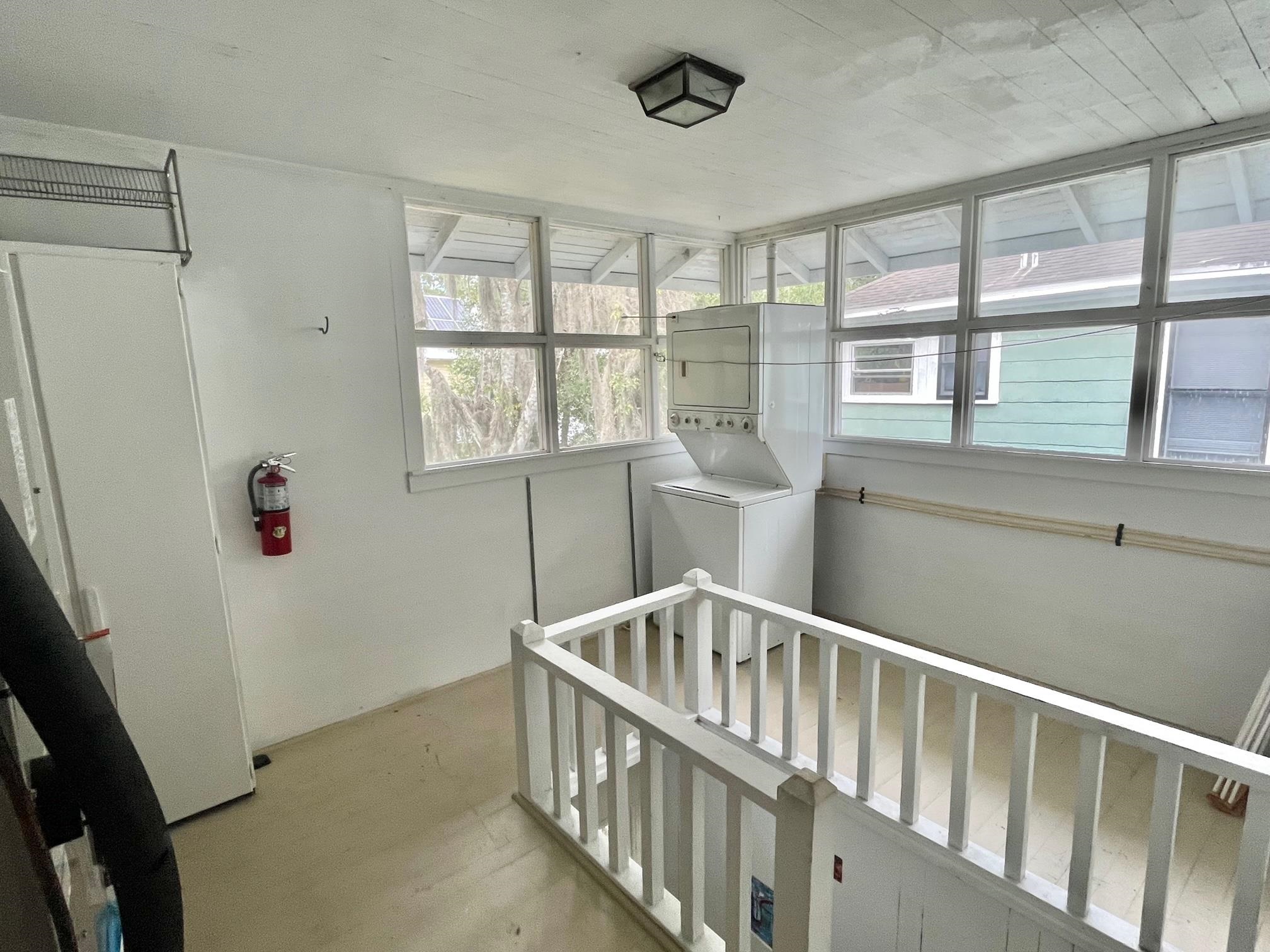 114 Bridge Street, Unit B St. Augustine, FL 32084 - Photo 11 of 14 a view of entryway with a window