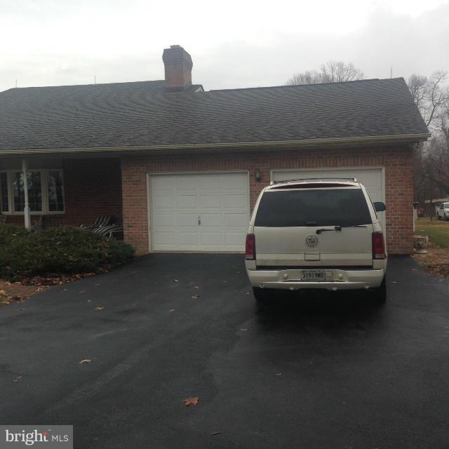 11833 Cash Smith Road Keymar, MD 21757 - Photo 3 of 16 a car parked in garage