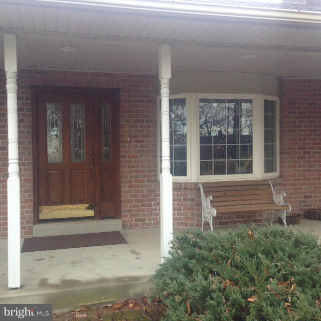 11833 Cash Smith Road Keymar, MD 21757 - Photo 4 of 16 a view of front door of a house