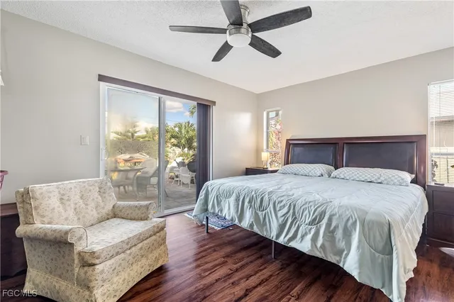 a bedroom with a large bed and a couch