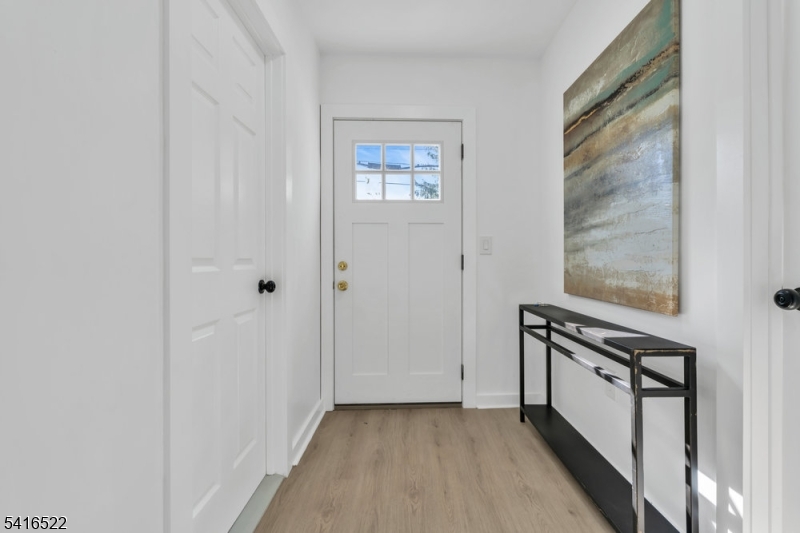 288 Harrison Street Nutley, NJ 07110 - Photo 2 of 21 a view of a hallway with front door