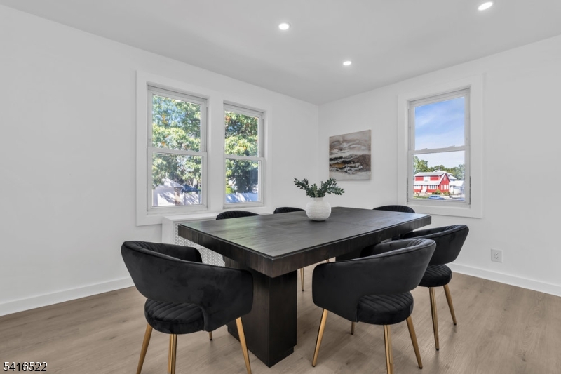 288 Harrison Street Nutley, NJ 07110 - Photo 6 of 21 a table and chairs in a room