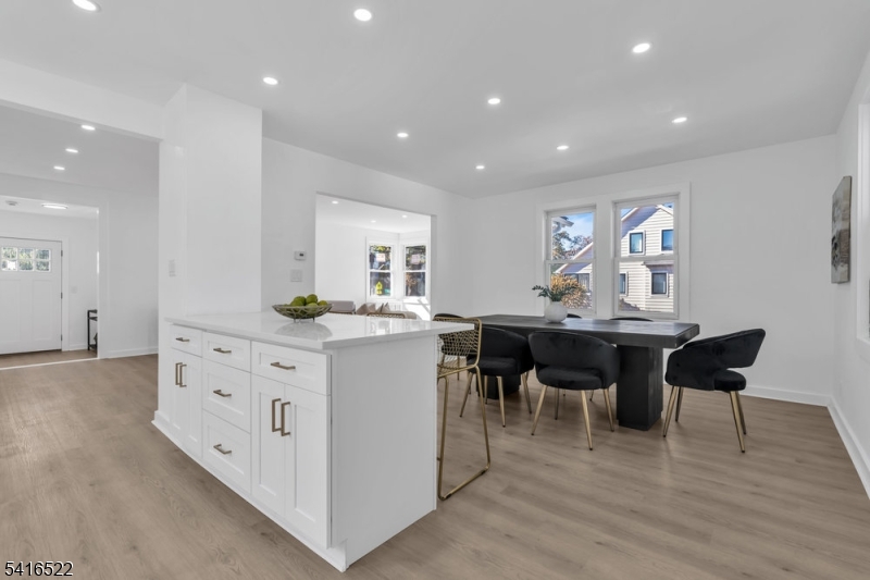 288 Harrison Street Nutley, NJ 07110 - Photo 7 of 21 a kitchen with cabinets and sink