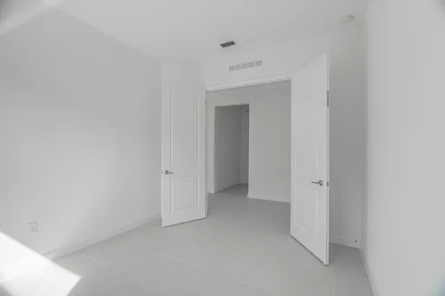 a bathroom with a sink toilet vanity and tub