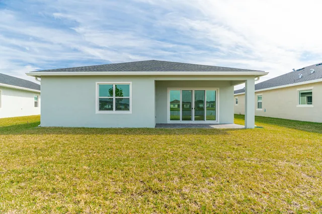 a view of outdoor space yard and front view of house
