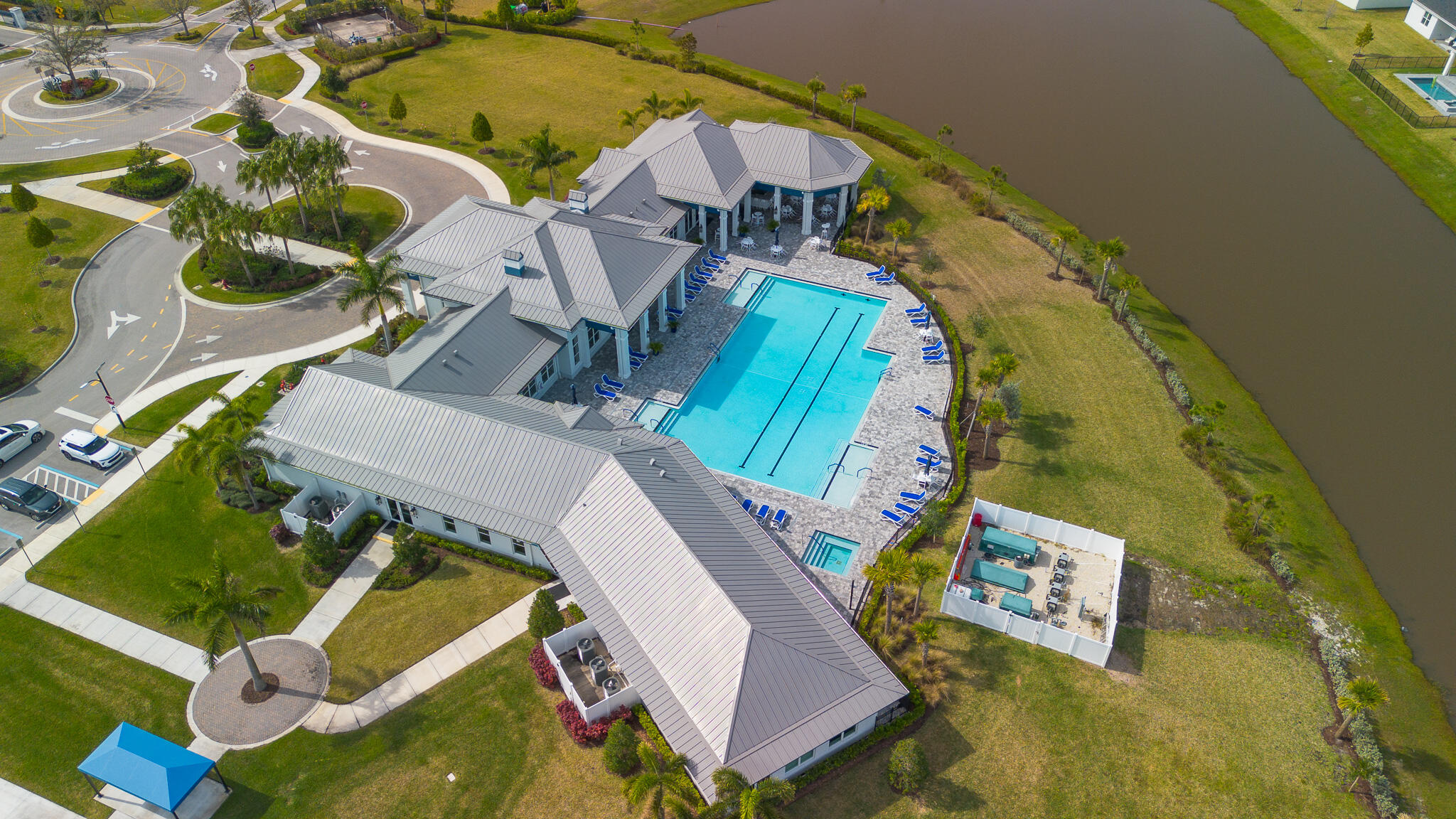 13885 Southeast Riversway St Port Port St. Lucie, FL 34984 - Photo 33 of 35 an aerial view of a house with a swimming pool