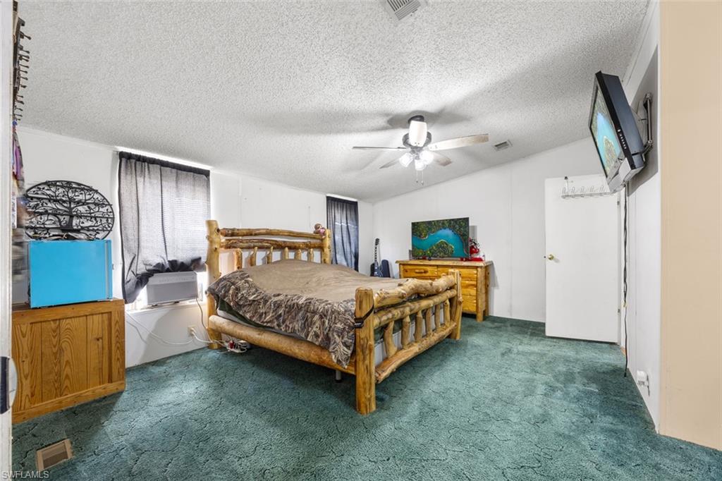 321 Brandy Lane Naples, FL 34114 - Photo 15 of 24 Master Bedroom