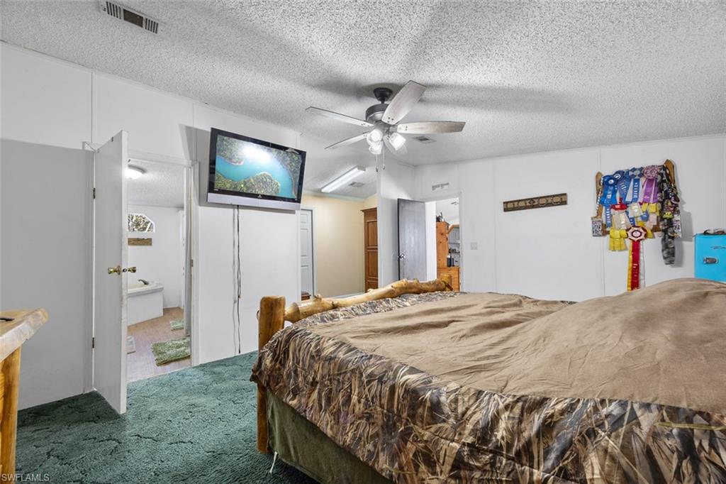 321 Brandy Lane Naples, FL 34114 - Photo 16 of 24 Master Bedroom